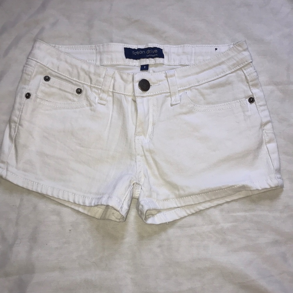 Ocean Drive white jean shorts.